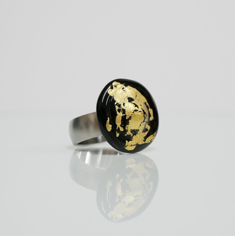 Ring schwarz gold
